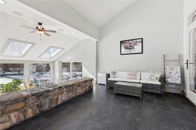 living room with lofted ceiling and a ceiling fan