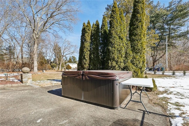 exterior space featuring a hot tub