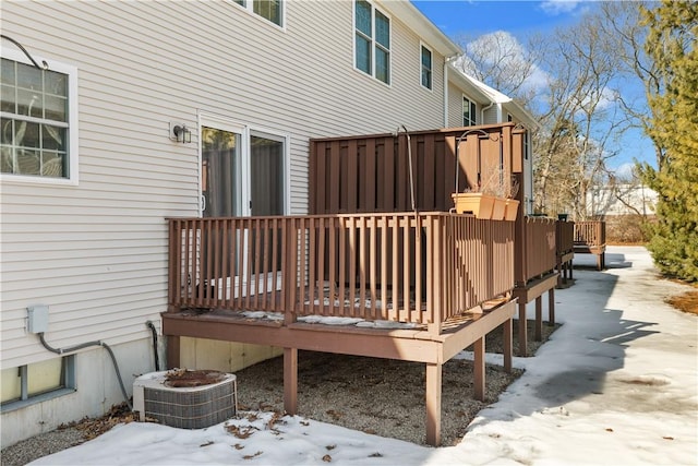 snow covered deck with central AC