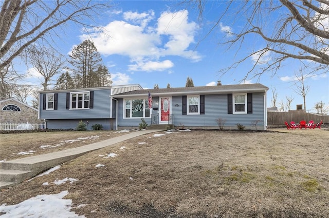 tri-level home with fence