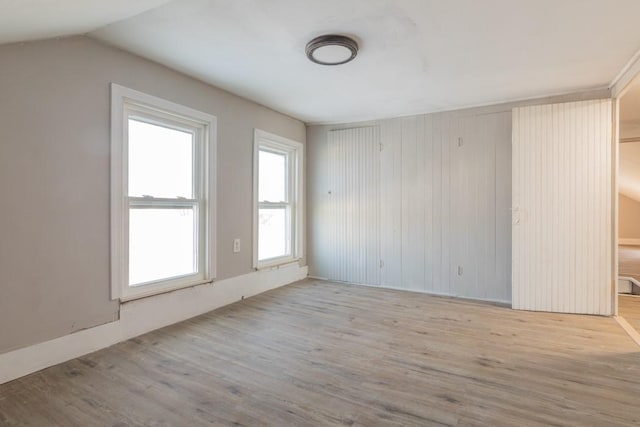 spare room with light wood-style flooring