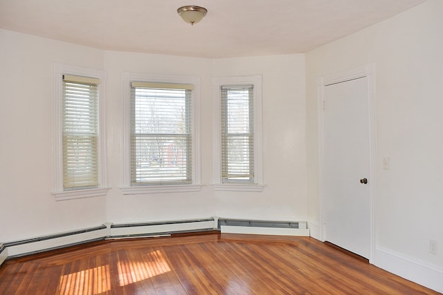 empty room featuring hardwood / wood-style flooring