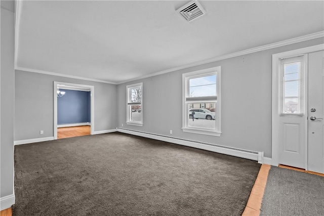 interior space with ornamental molding, baseboards, visible vents, and baseboard heating