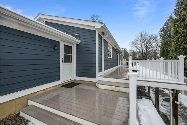 view of snow covered deck