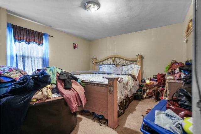 bedroom with light carpet