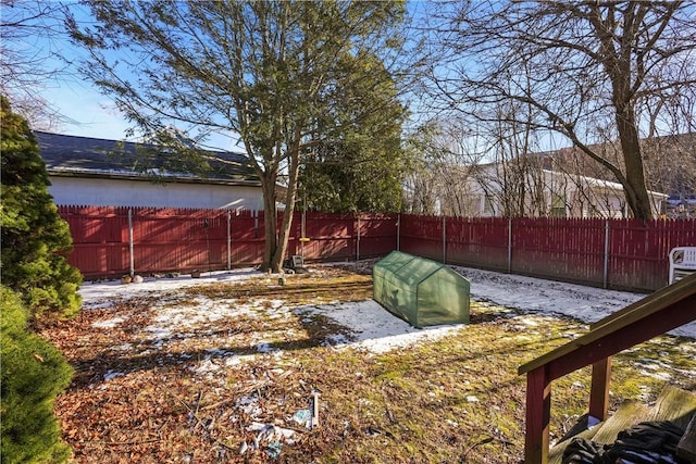 view of yard with a fenced backyard