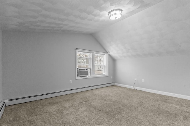 additional living space featuring a baseboard radiator, carpet flooring, vaulted ceiling, cooling unit, and baseboards