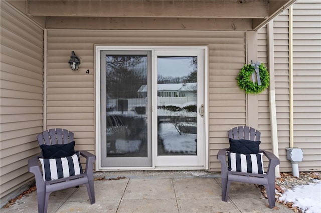 doorway to property featuring a patio