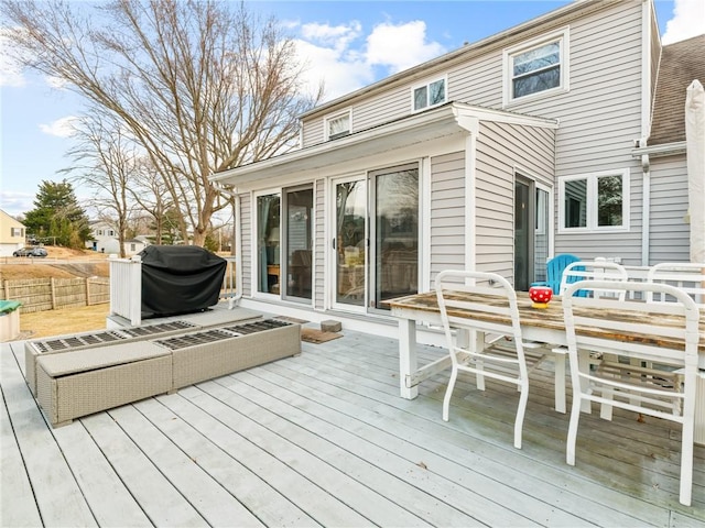 wooden deck featuring fence and outdoor dining area