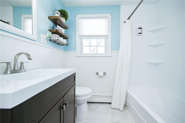 bathroom with toilet, a wainscoted wall, a baseboard radiator, marble finish floor, and vanity