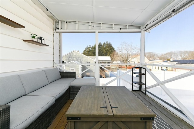 wooden deck with outdoor lounge area