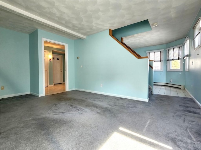 unfurnished room featuring stairs, baseboard heating, baseboards, and light colored carpet