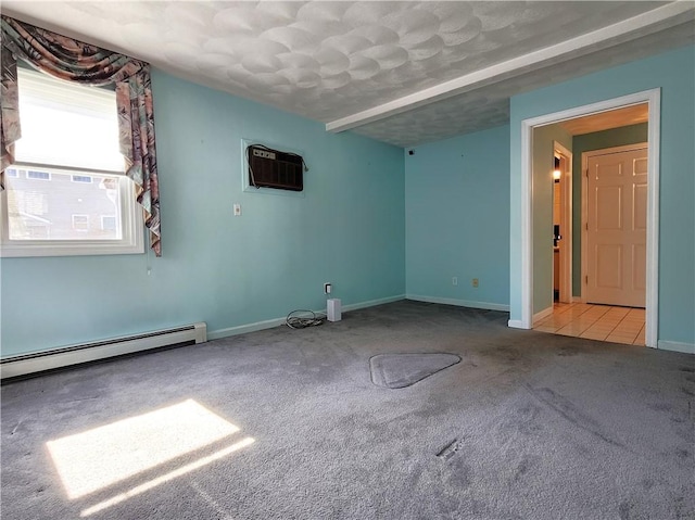 unfurnished room with baseboards, a wall mounted AC, baseboard heating, and light colored carpet