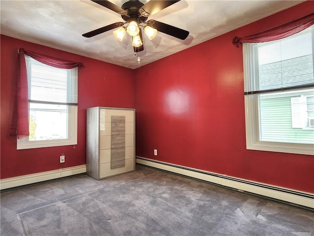 unfurnished bedroom with carpet floors and a baseboard radiator