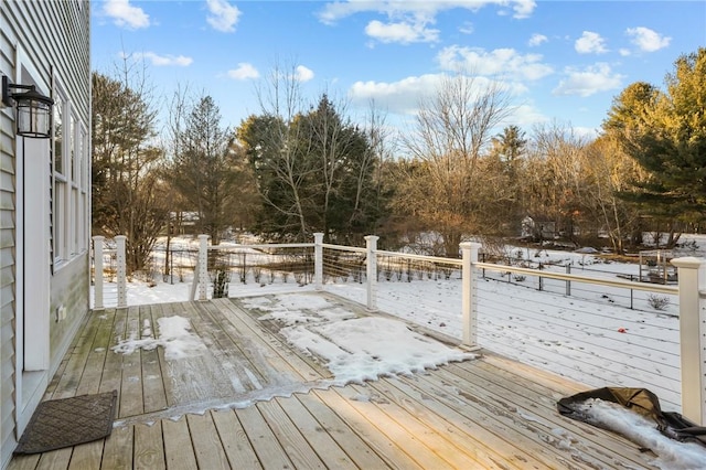 view of snow covered deck