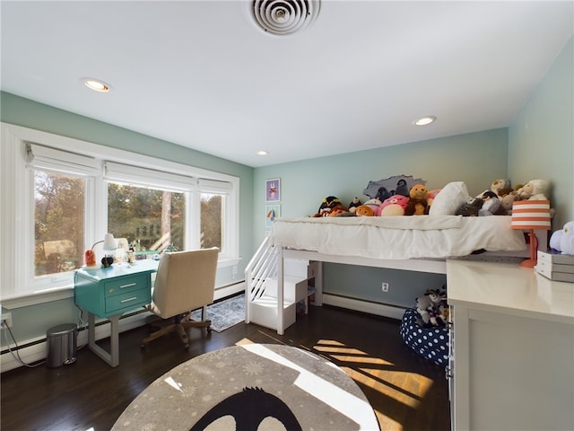 bedroom with a baseboard radiator, dark wood-style flooring, visible vents, and recessed lighting