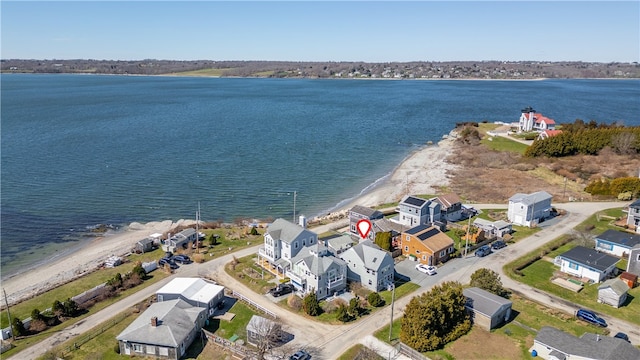 aerial view featuring a water view and a residential view