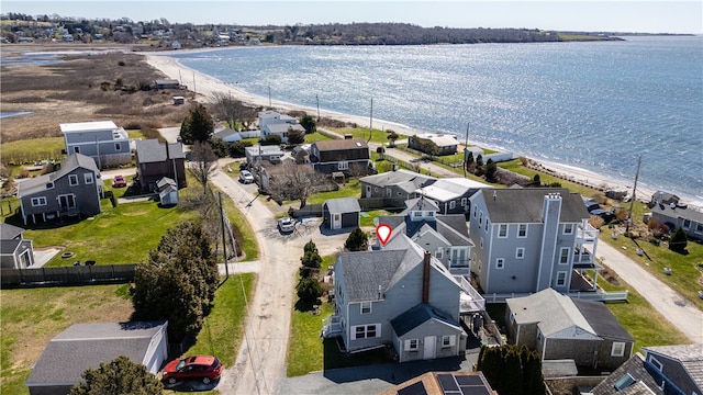 aerial view featuring a residential view and a water view