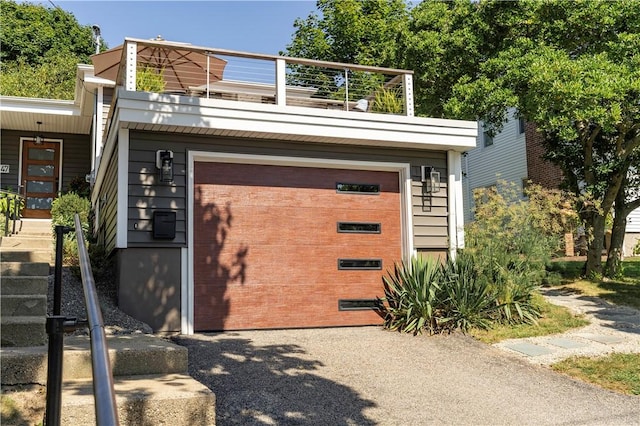 exterior space featuring a garage and driveway