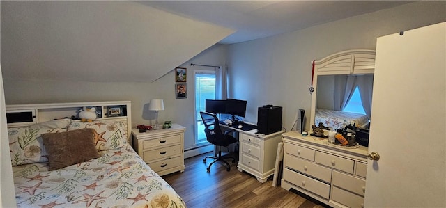 bedroom featuring baseboard heating, vaulted ceiling, and dark wood-style flooring