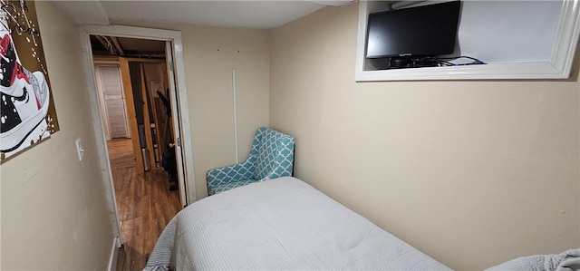 bedroom featuring wood finished floors