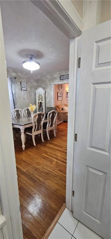 corridor featuring wood finished floors