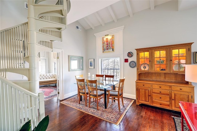 dining space featuring high vaulted ceiling, dark wood-style flooring, beamed ceiling, and baseboards