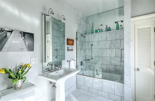 full bath featuring tiled shower / bath combo