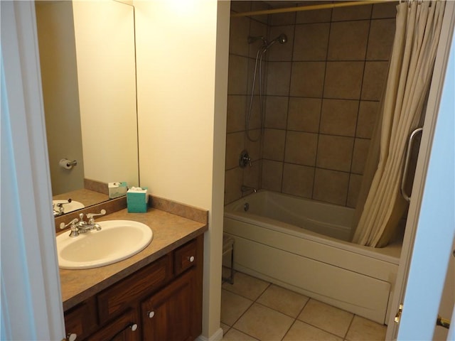 full bathroom with tile patterned flooring, vanity, and shower / bath combo