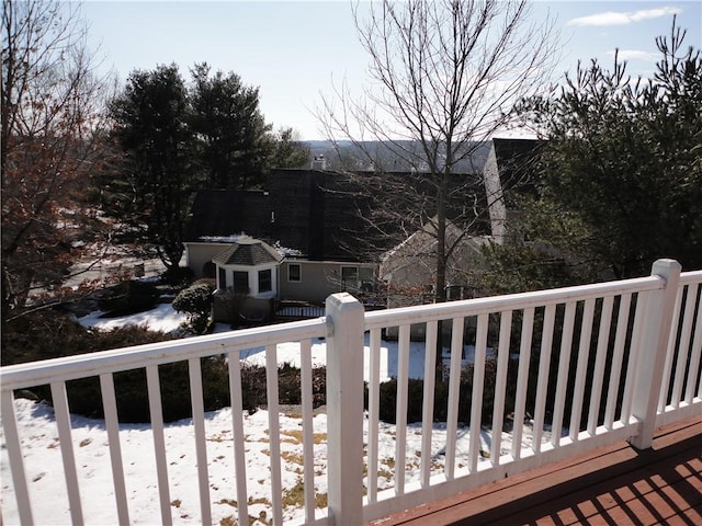 view of snow covered deck