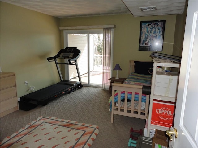 bedroom with access to exterior, carpet, and visible vents