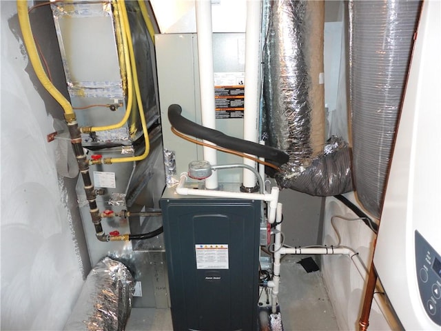 utility room with water heater