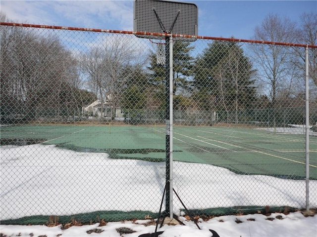 view of sport court with fence