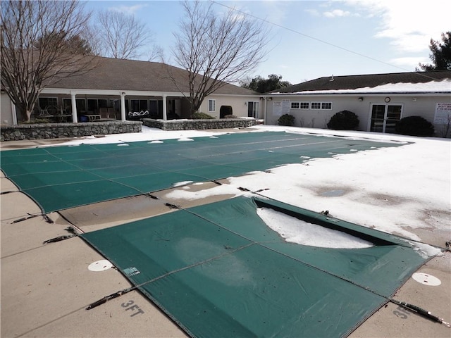 community pool with a patio