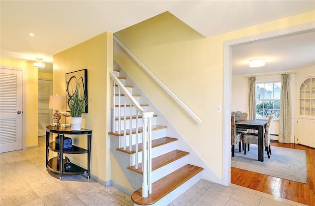 stairs featuring baseboards