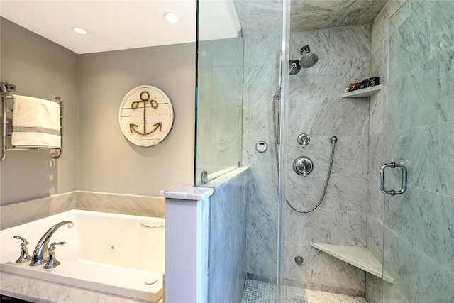 full bath featuring recessed lighting, a garden tub, and a shower stall