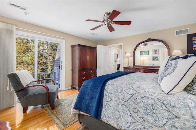 bedroom with access to exterior, ceiling fan, visible vents, and light wood finished floors