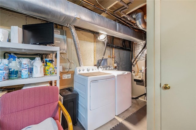 laundry area featuring laundry area and washing machine and dryer