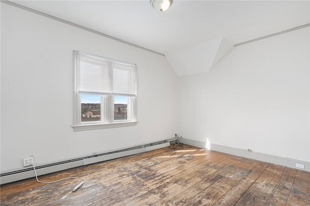 empty room with lofted ceiling, baseboards, hardwood / wood-style floors, and baseboard heating