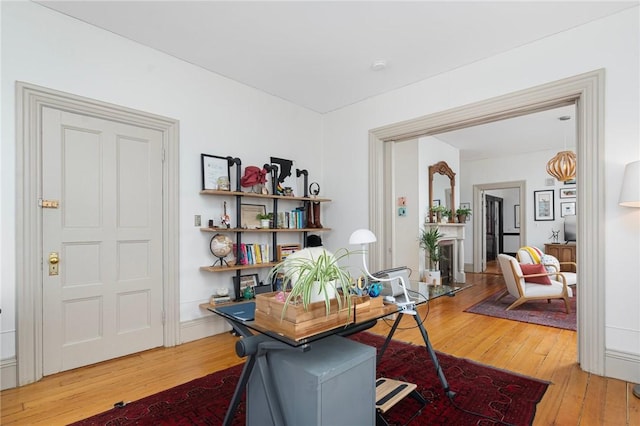 office with hardwood / wood-style flooring