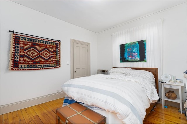 bedroom with light wood-type flooring