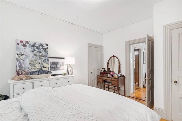 bedroom with light wood-style flooring