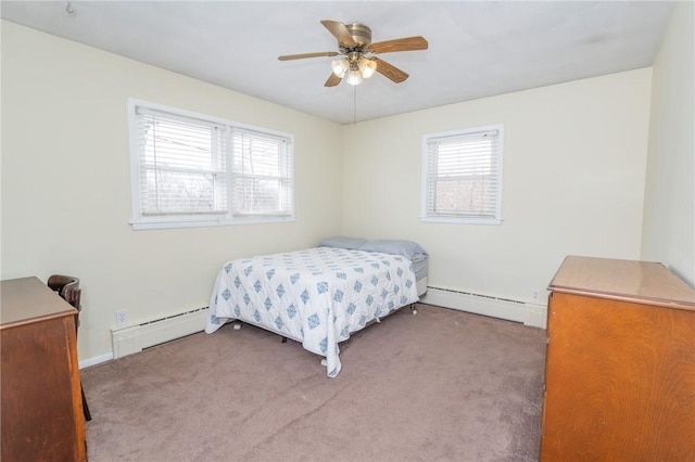 bedroom featuring a baseboard radiator, carpet flooring, and ceiling fan