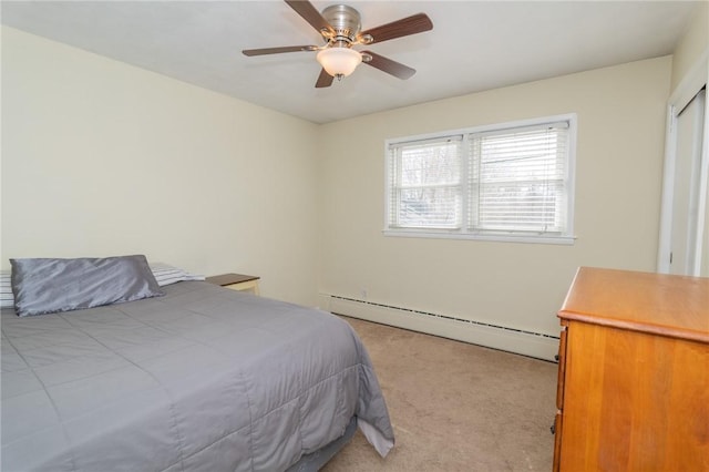 bedroom with light carpet, ceiling fan, and baseboard heating