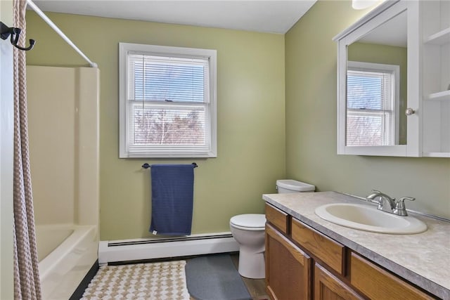 full bath featuring bathing tub / shower combination, a baseboard radiator, vanity, and toilet