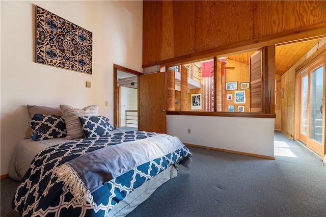 bedroom featuring carpet flooring and baseboards