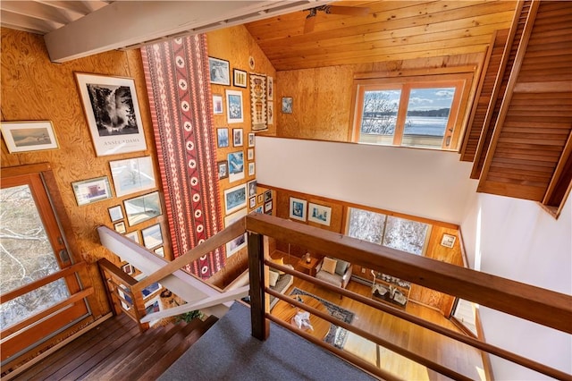 interior space featuring wood walls