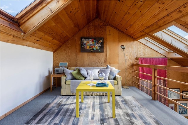 living area featuring lofted ceiling with skylight, wood ceiling, baseboards, and carpet