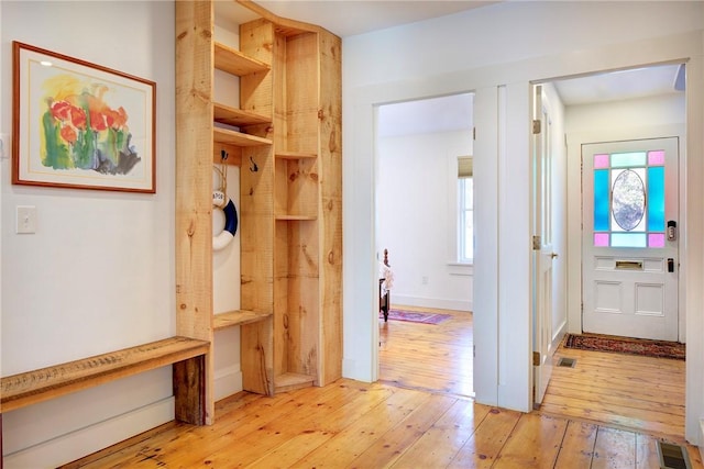 mudroom featuring visible vents and light wood-type flooring