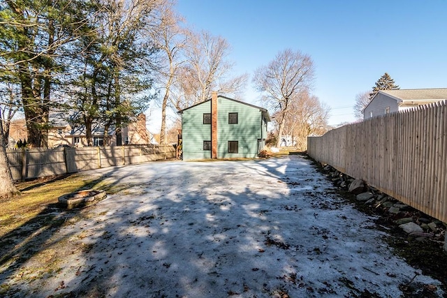 exterior space featuring a fenced backyard